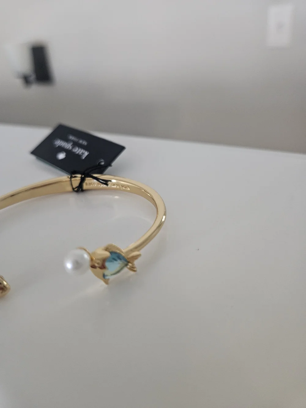 kate spade Gold Open Bangle with Blue Crystal Fish and Pearl Accent - Picture 4 of 6